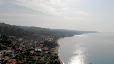 Aerial-view-of-the-small-Greek-village-on-the-shore-of-the-Aegean-Sea