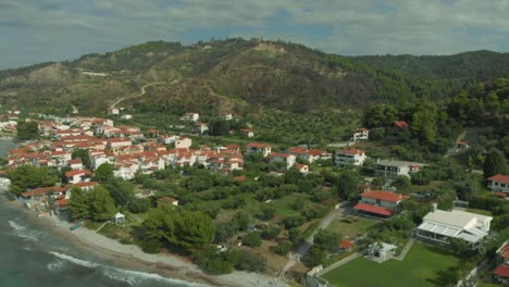 Aerial-view-of-the-small-Greek-village-on-the-shore-of-the-Aegean-Sea