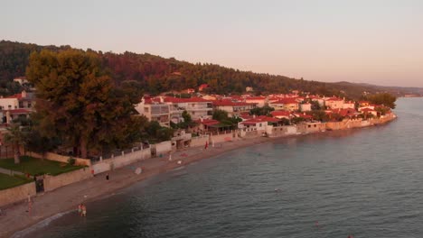 Aerial-view-of-the-small-Greek-village-on-the-shore-of-the-Aegean-Sea