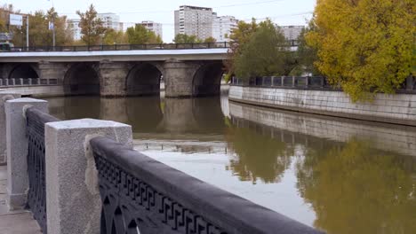 panoramic-view-of-the-embankment-of-the-city-river-and-cast-iron-fence