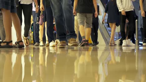 A-crowd-of-people-moving.-Look-at-the-feet