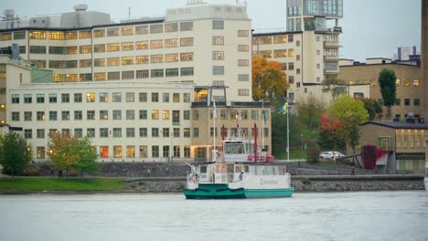 A-slow-moving-boat-on-the-lake-channel-in-Stockholm-Sweden