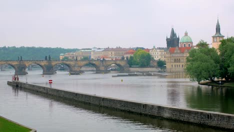 wonderful-calm-cityscape-in-Prague,-view-on-Vltava-river,-old-famous-Charles-bridge