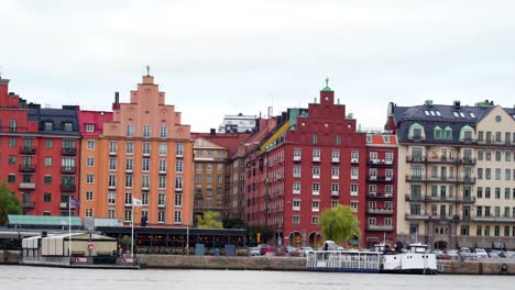 Red-tall-buildings-across-the-streets-in-Stockholm-Sweden