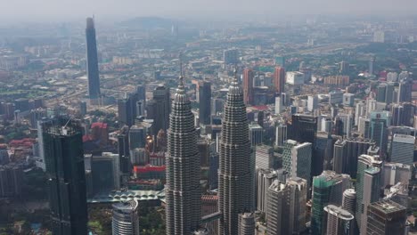 soleado-día-Kuala-Lumpur-ciudad-centro-panorama-aéreo-4k-Malasia