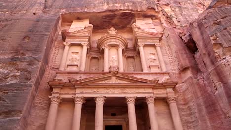 Al-Khazneh or The-Treasury at-Petra,-Jordan---it-is-a-symbol-of-Jordan,-as-well-as-Jordan's-most-visited-tourist-attraction.-Petra-has-been-a-UNESCO-World-Heritage-Site-since-1985