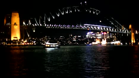 Puente-del-Puerto-de-Sydney-en-la-noche,-las-luces-de-la-ciudad