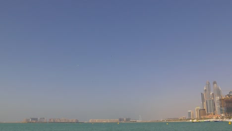 uae-sun-light-dubai-marina-bridge-panorama-4k