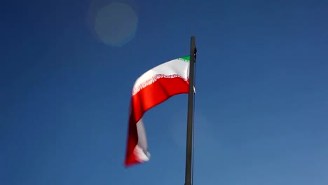 National-flag-of-Iran-on-a-flagpole