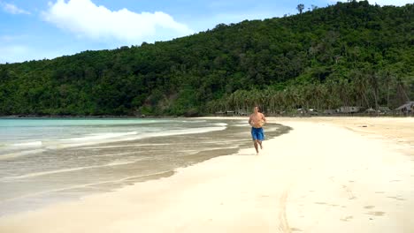 Man-running-on-the-beach