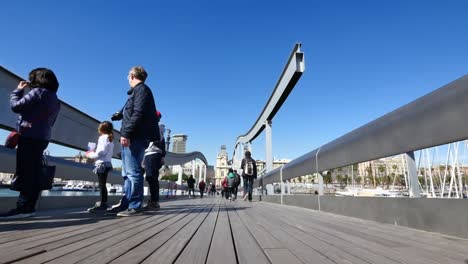 Crossing-Maremagnum-Marketplace-Bridge-in-Barcelona