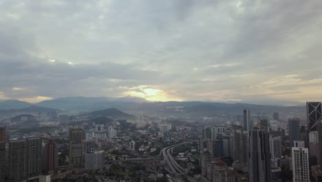 Aerial-Footage---Petronas-Towers-at-Sunrise.-Flat-Color-Profile.