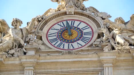 The-clock-about-to-strike-12-noon-from-the-Basilica-of-Saint-Peter-in-Vatican-Rome-Italy