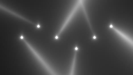 Leuchtende-Neonweiße-Scheinwerferstrahlen-Auf-Der-Disco-Bühne
