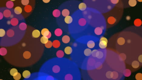 Falling-gold-and-blue-glitters-and-round-bokeh-in-blue-night-sky