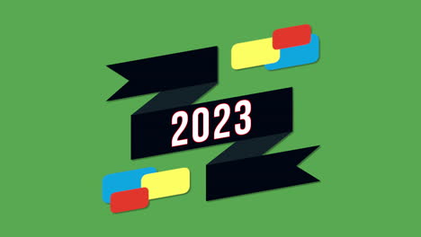 2023-Mit-Band-Und-Bunten-Formen-Auf-Grünem-Farbverlauf