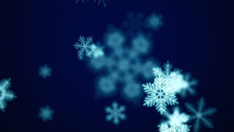 Falling-blue-snowflakes-and-glitters-in-dark-sky