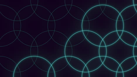 Blue-neon-circles-pattern-on-black-gradient