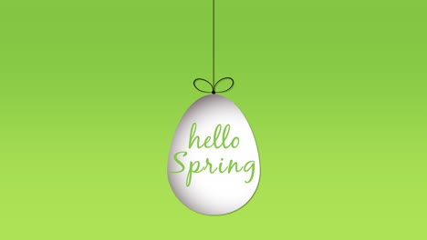 Hello-Spring-with-hanging-easter-egg-on-green-gradient