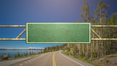 Road-sign-with-road-and-forest-in-daytime