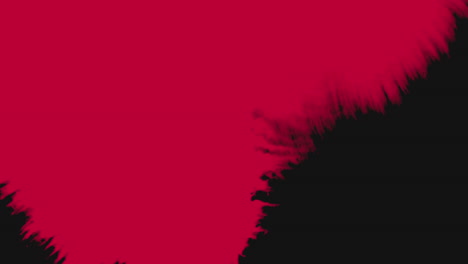 Splashing-red-watercolor-brush-on-black-gradient