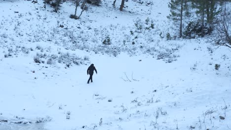 Man-Hiking-in-Snowy