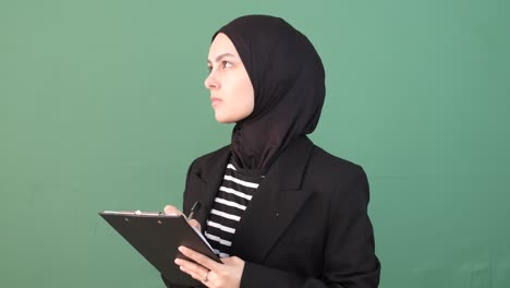 Hijab-Girl-Writing