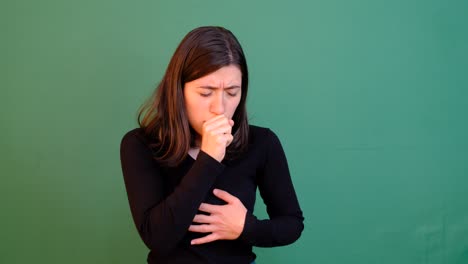 Woman-Coughing-Green-Background
