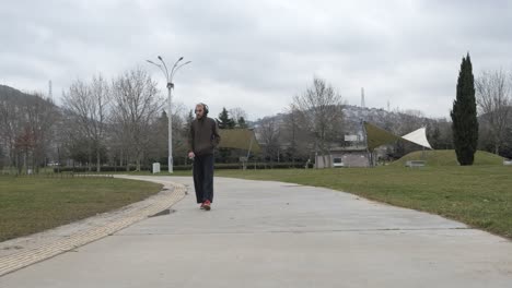 Man-Strolling-On-Park