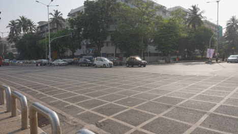 Busy-Traffic-Junction-In-Mumbai-India-With-Cars-And-Buses-On-Marine-Drive