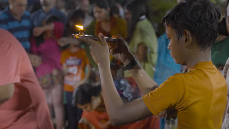 Close-Up-Of-People-Celebrating-Hindu-Festival-Of-Holi-With-Bonfire-In-Mumbai-India-7