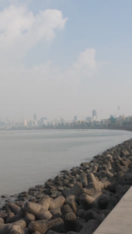 Vertical-Video-Of-Mumbai-City-Skyline-From-Marine-Drive-Walk-In-India