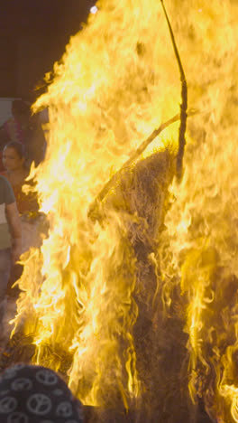 Vertical-Video-Close-Up-Of-Flames-From-Bonfire-Celebrating-Hindu-Festival-Of-Holi-In-Mumbai-India1