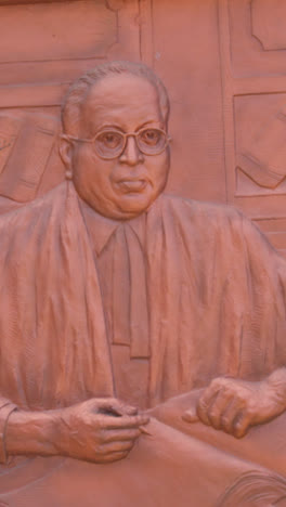 Vertical-Video-Of-Scenes-From-Life-Of-Freedom-Fighter-Dr-B-R-Ambedkar-Carved-In-Stone-In-Mumbai-India