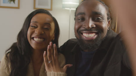 POV-Shot-Of-Couple-Announcing-Their-Engagement-On-Video-Call
