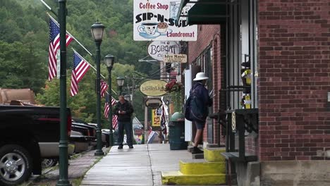 People-walk-into-small-downtown-stores-in-Vermont