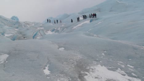 A-group-of-explorers-move-across-a-glacier
