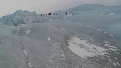 A-group-of-explorers-move-across-a-glacier-1