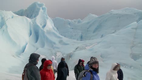 Hikers-stand-in-an-Arctic-scene