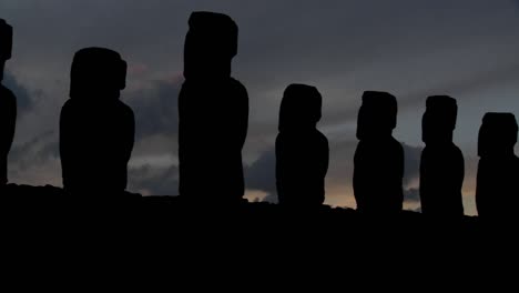 A-pan-across-Easter-Island-statues-at-dusk