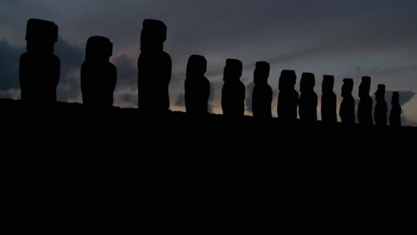 A-long-line-of-statues-is-silhouetted-on-Easter-Island