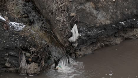 Polluted-water-flows-into-an-irrigation-ditch