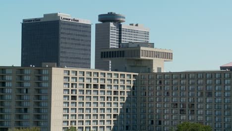 A-generic-conference-center-or-hotel-with-many-rooms-and-windows-with-tall-buildings-behind