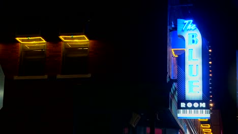 A-neon-sign-reads-The-Blue-Room
