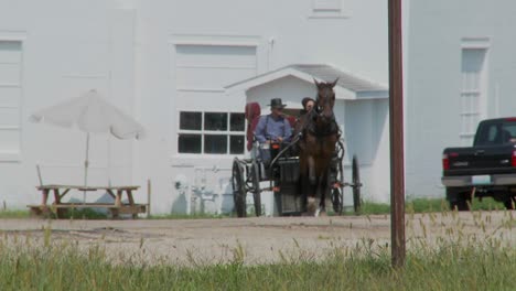 An-Amish-horse-and-buggy-moves-amongst-modern-traffic