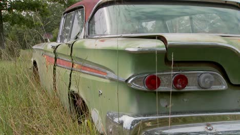 An-old-Ford-Edsel-sits-in-a-field-8
