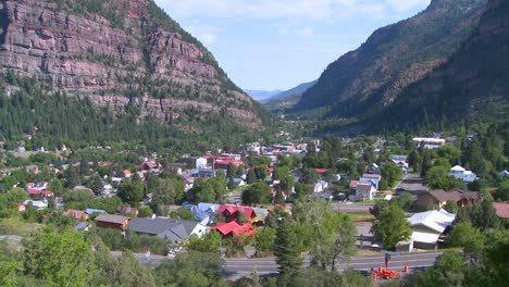 A-downtown-establishing-shot-of-Ouray-Colorado-with-steam-train-passing