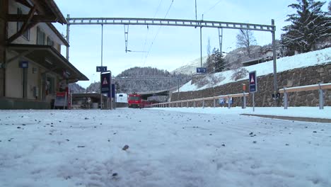 A-Swiss-rail-train-arrives-at-a-station-in-Switzerland-in-winter