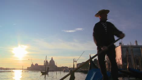 POV-of-a-gondolier-rowing-a-gondola-through-the-canals-of-Venice-Italy
