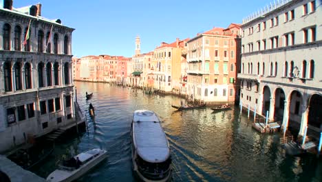 Boats-move-along-the-Grand-Canal-in-Venice-Italy